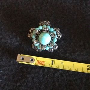Turquoise and silver costume jewelry pin